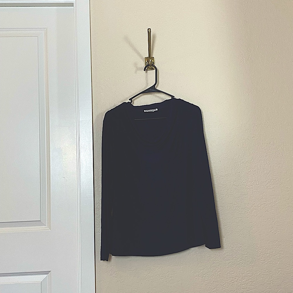 Navy blouse with neck detail. Used. Good